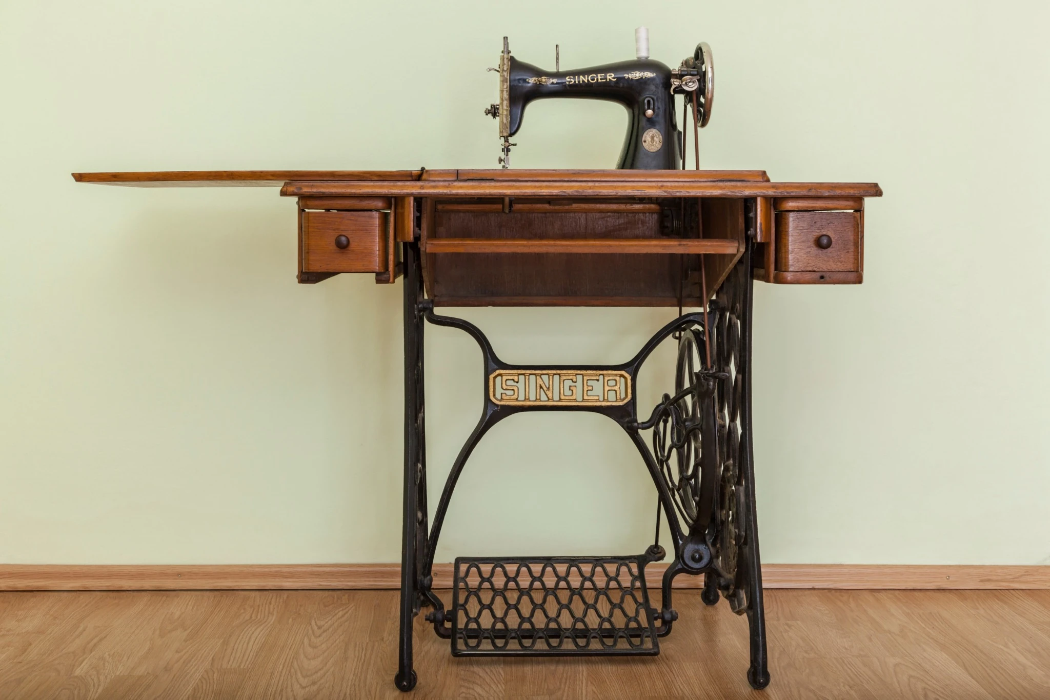 Photograph of an old Singer sewing machine.