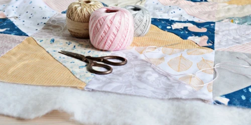 Quilting material with scissors.